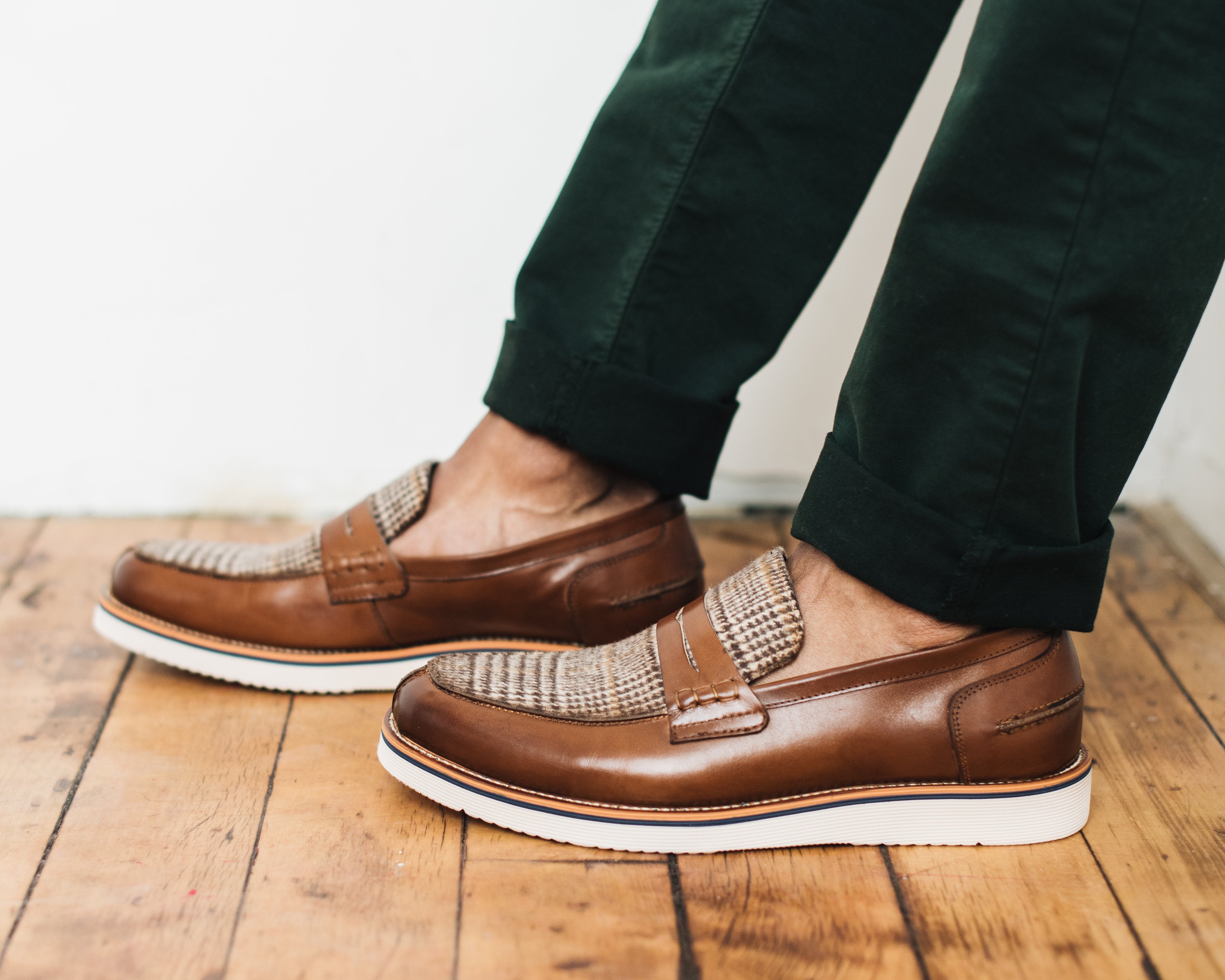 Dress shoe sneakers and loafers are trending this spring for men.