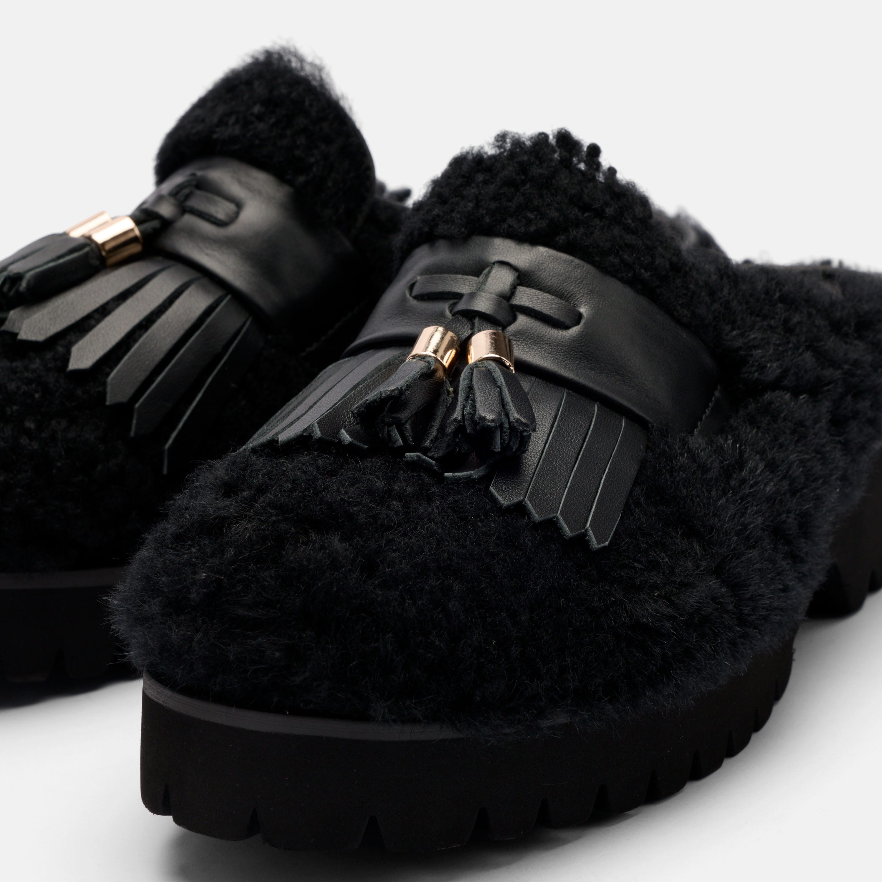 Hollis Black Shearling Tassel Mule