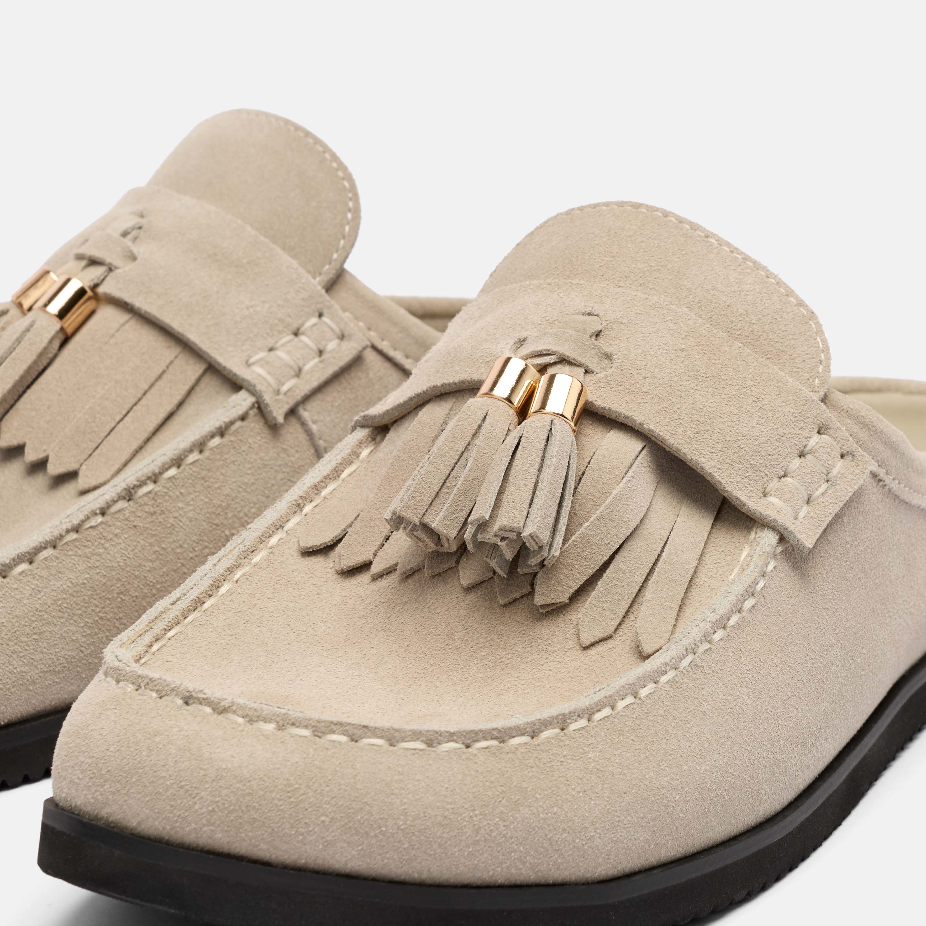 Ms. Hampton Stone Suede Tassel Mules