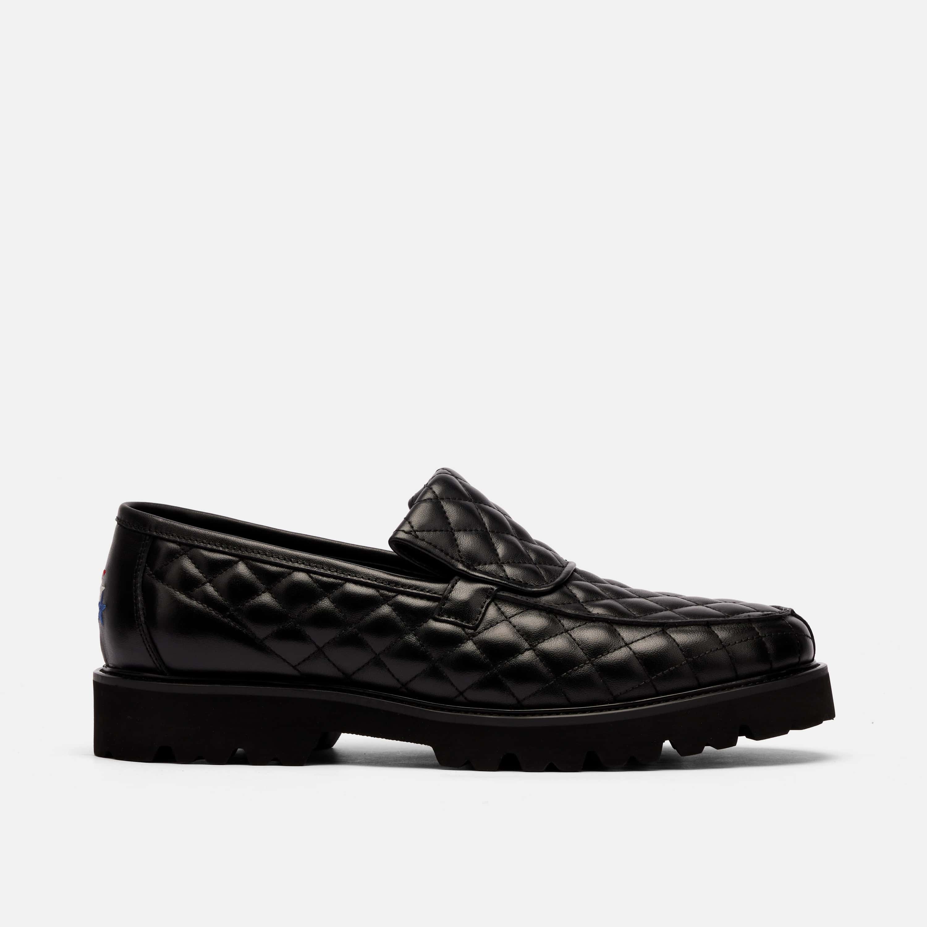 The Pitch Black Quilted Leather Lug Penny Loafers
