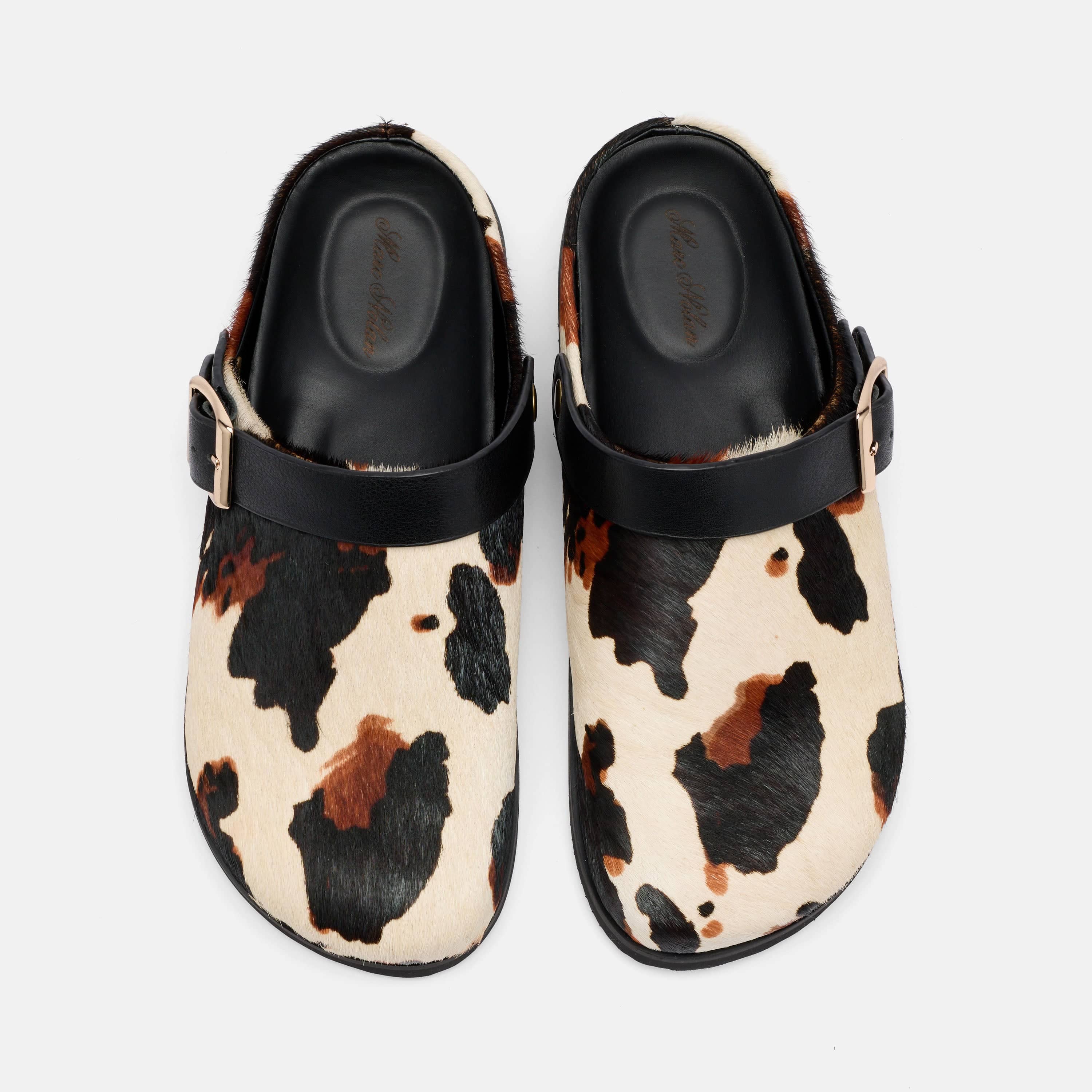 Ms. Solana Cow Print Backstrap Clogs