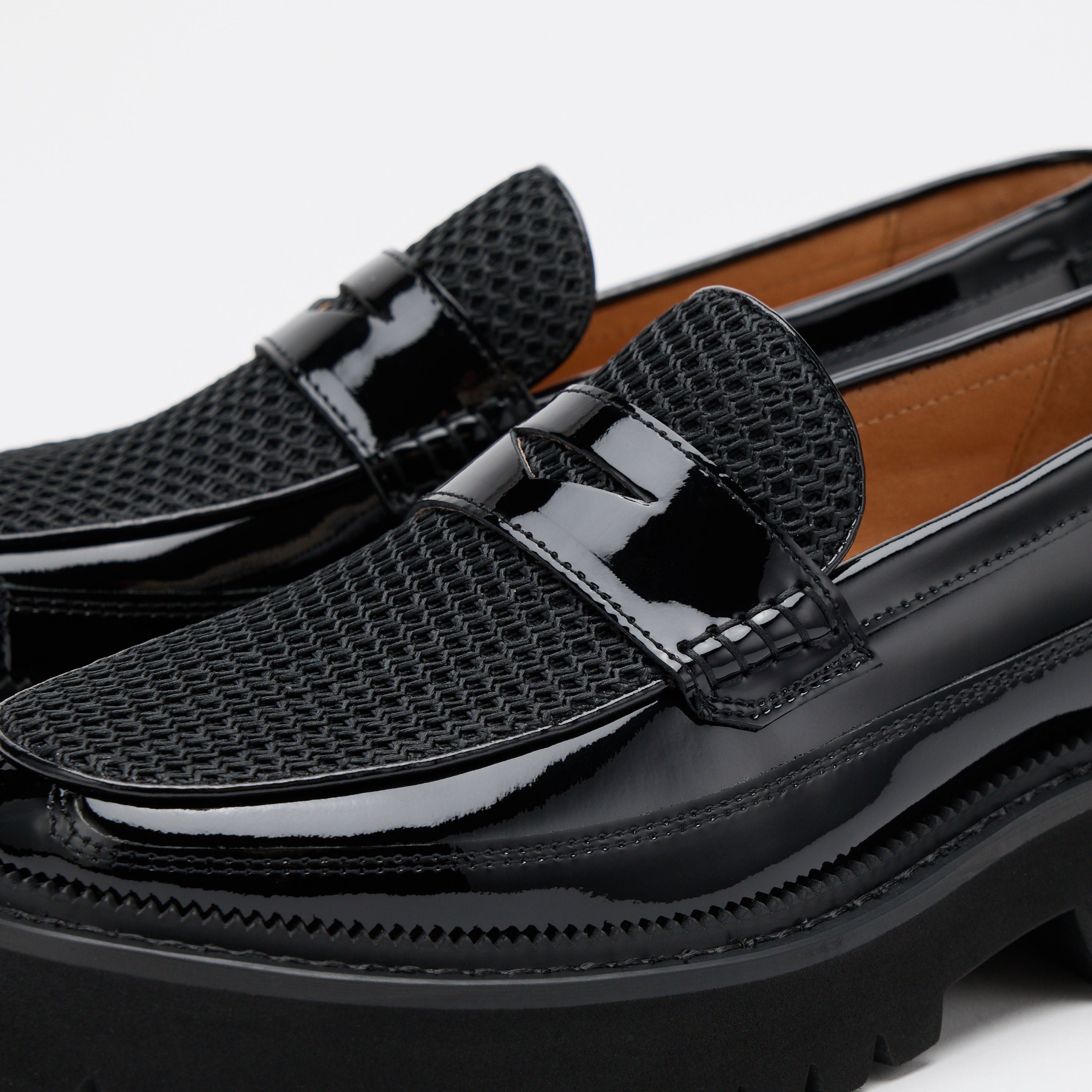 Ms. Adler Black Patent Leather Lug Penny Loafers