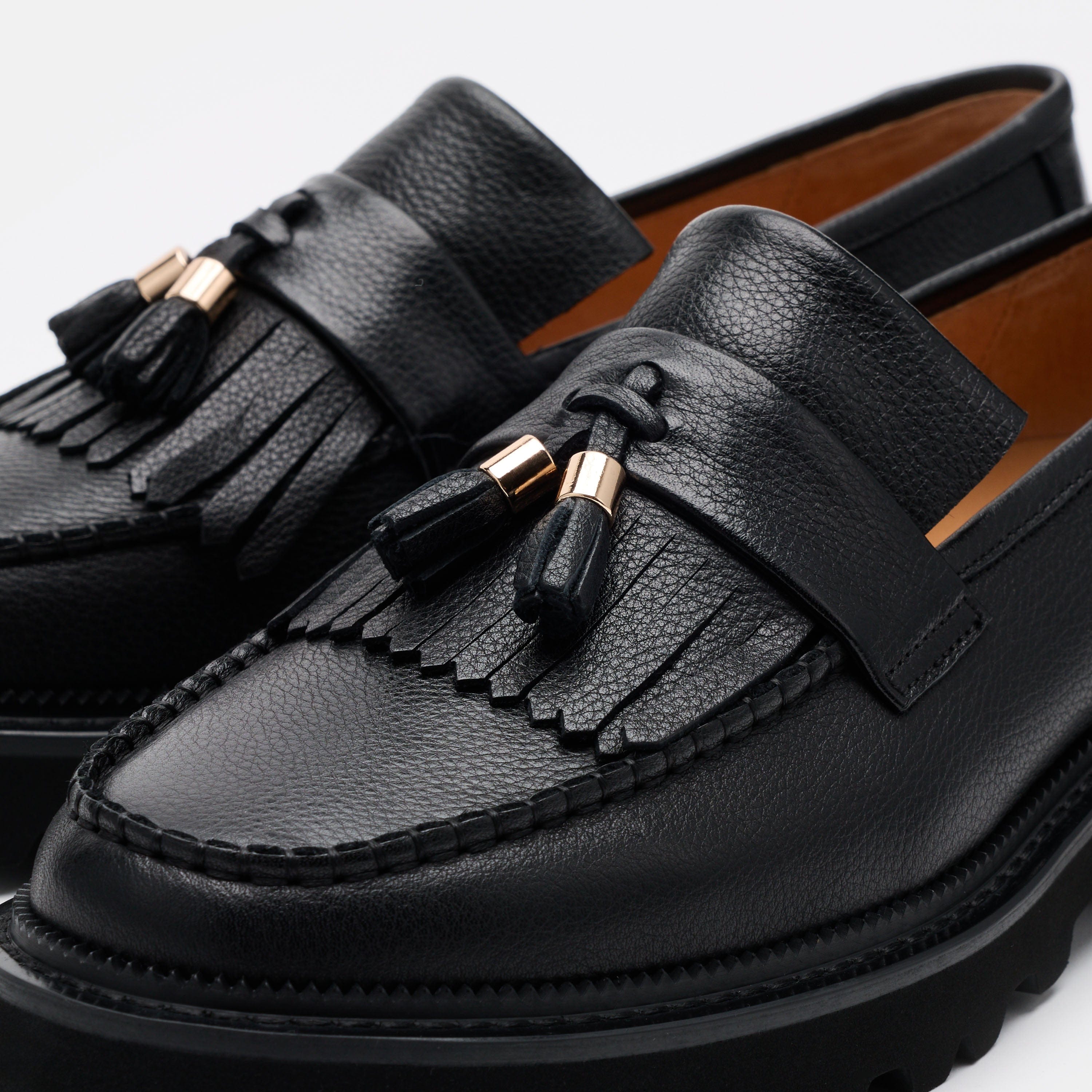 Journey Black Pebble Leather Lug Tassel Loafer