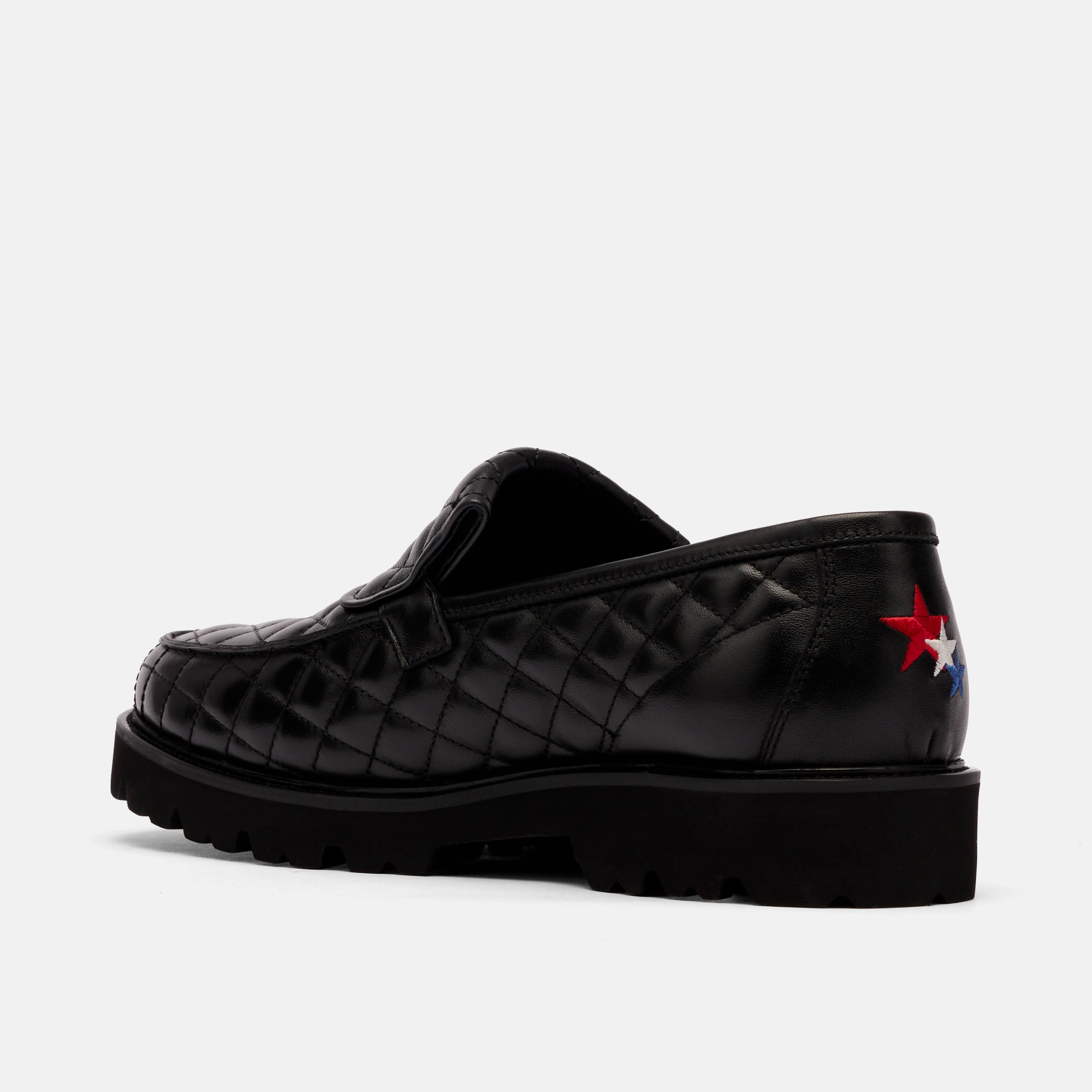The Pitch Black Quilted Leather Lug Penny Loafers