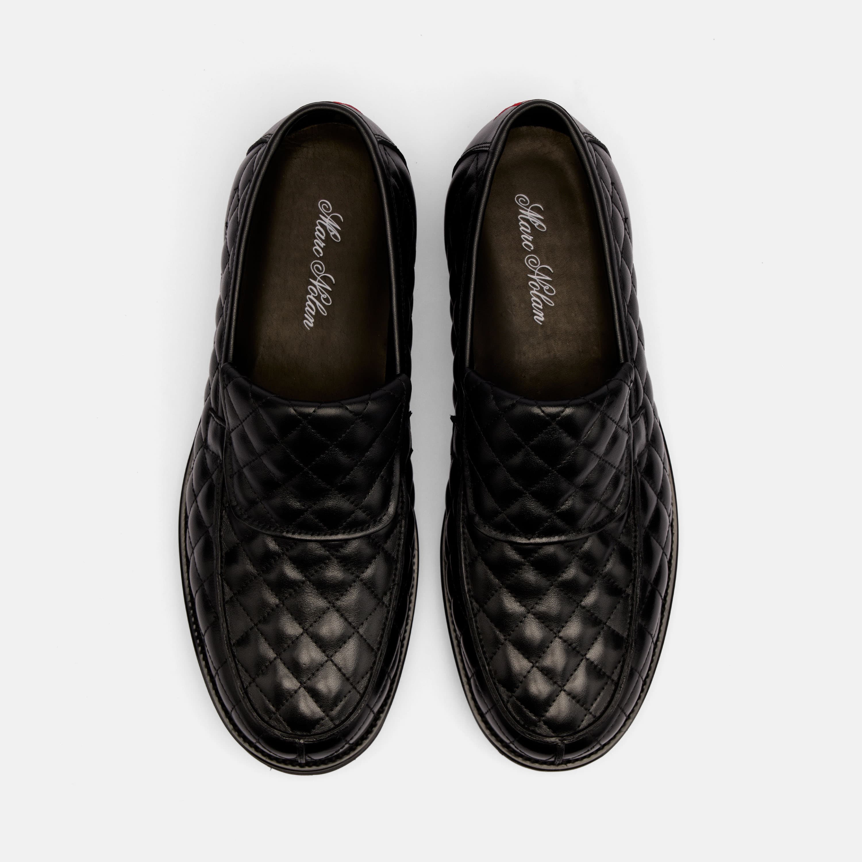 The Pitch Black Quilted Leather Lug Penny Loafers