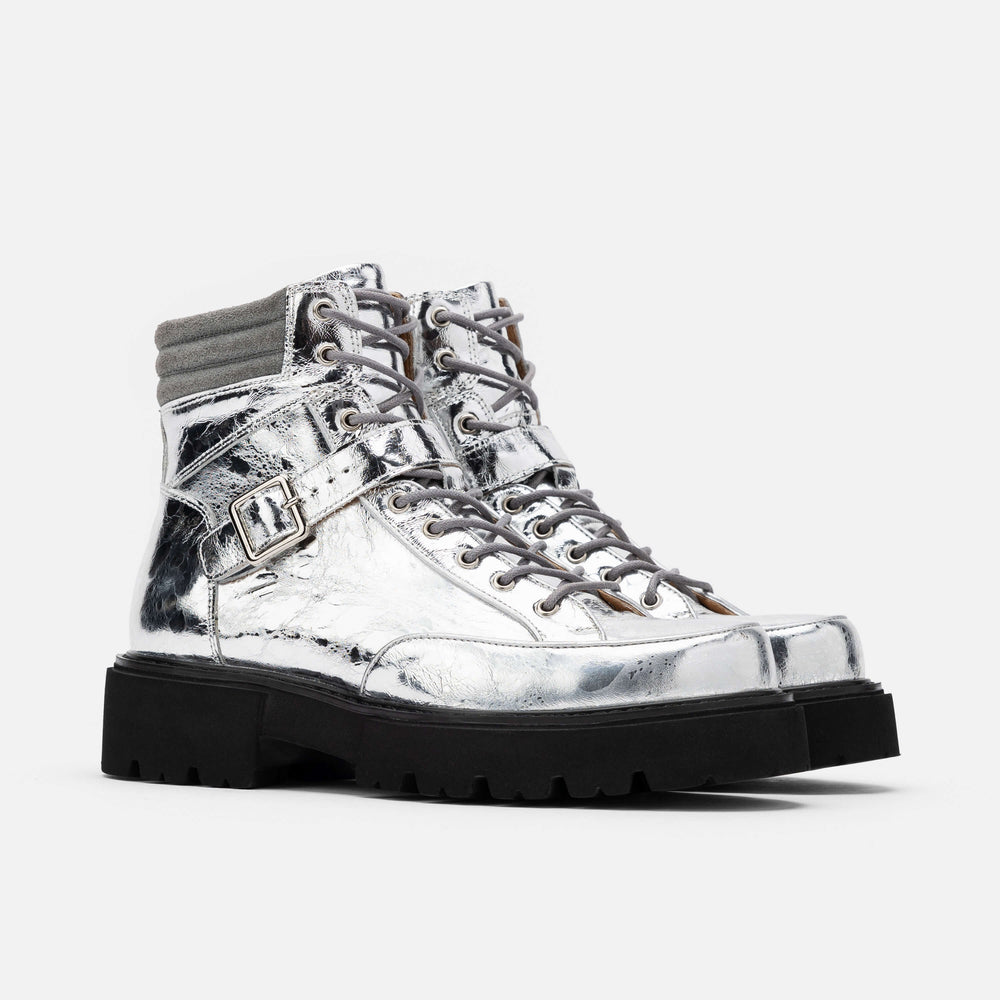Ms. Atlas Chrome Patent Leather Strap Boots