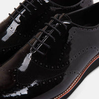Oscar Black Patent Leather Wholecut Brogue Sneakers